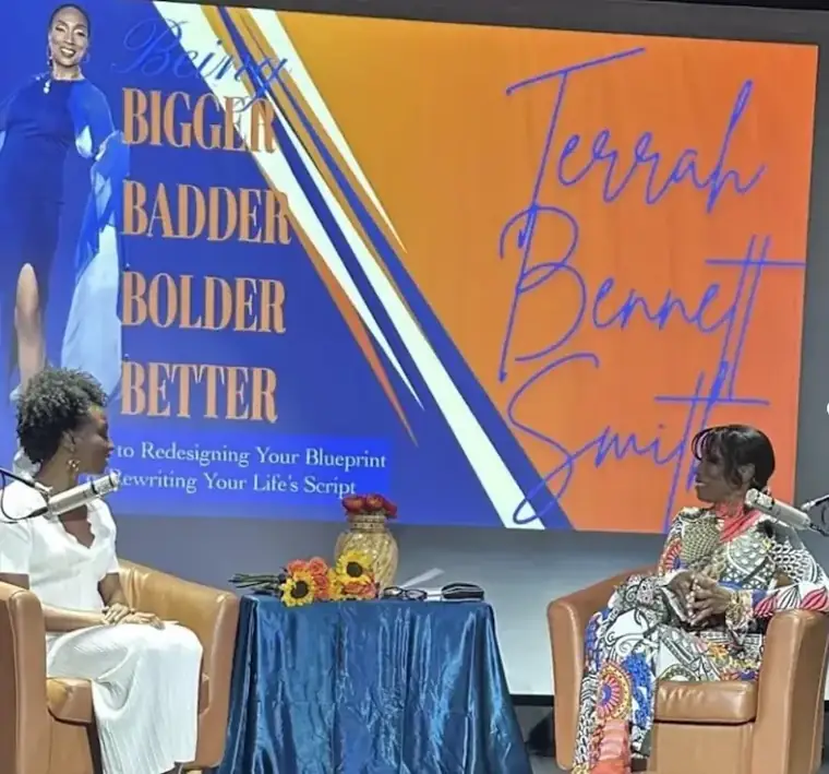 Terrah on stage at a Being Bigger Badder Bolder Better event